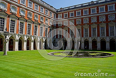 London, England, July 16th 2019: View of Hampton Court Palace courtyard with blue sky Editorial Stock Photo